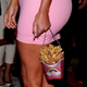 Kim Kardashian holding her own French fry purse in 2018.